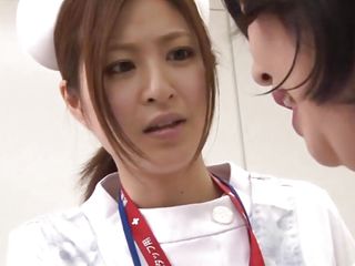 japanese nurse comforts her patient