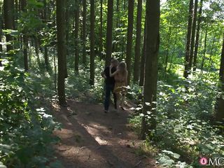 horny milf sucks his cock in the forest